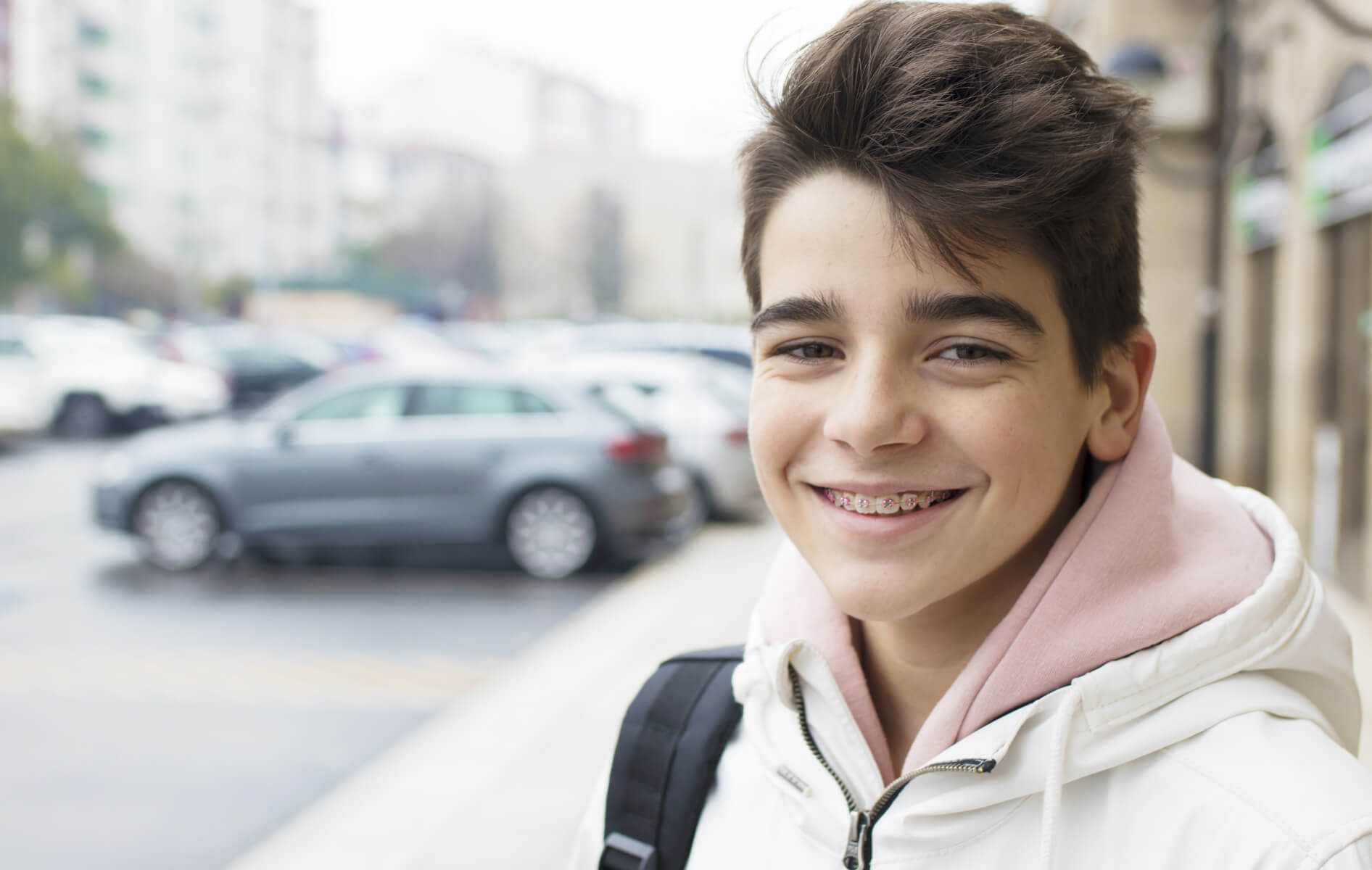 Teenage boy smiling with braces